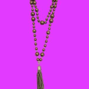 Copper colored chain necklace w tassel of silver on end  long 28/32 inches